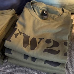 Olive Green t-shirt with black lettering item