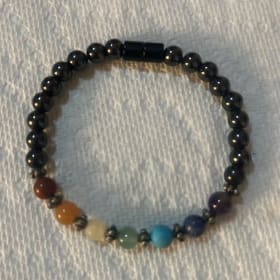 Polished stone bracelet with magnetic clasp item