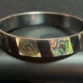 Mother of Pearl and black inlay metal bracelet. item