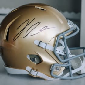 Notre Dame Football Golden Helmet Signed by Jeremiah Love item