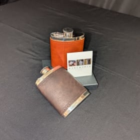 His and Hers Leather-wrapped Pewter Flasks item