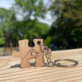 Building Better Beginnings Puzzle Piece Keychain (Silver) item