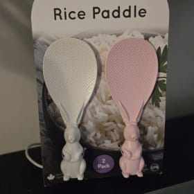 A pair of rice paddle rabbit spoons item