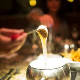 Photo of Item # 7 – $75 Melting Pot Gift Certificate