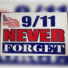 Photo of 911 yard sign with metal stand