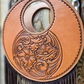 Classic Floral Tooled Round Handbag item