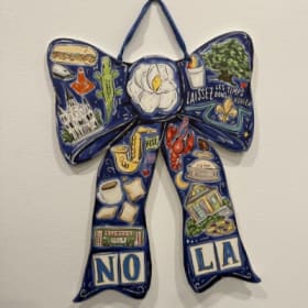 NOLA themed door hanger item