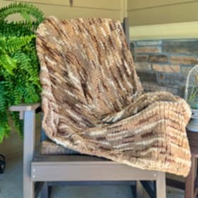 Photo of Oversized Chenille Knitted Throw