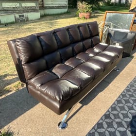 Faux leather click sleeper sofa item