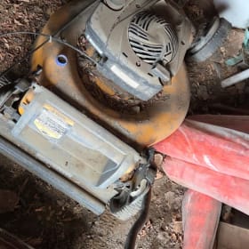 Yellow Push Lawn Mower item