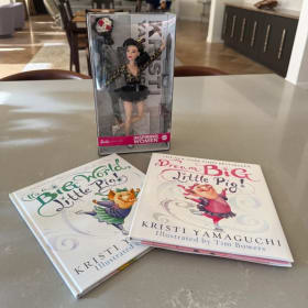 Signed Kristi Yamaguchi Barbie and 2 Children's Books item