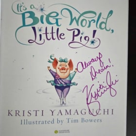 Signed Kristi Yamaguchi Barbie and 2 Children's Books item
