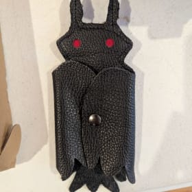Leather Mothman keychain holder item