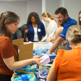 Photo of Corporate Packing Event — $1,500 / 100 kits