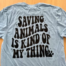 Photo of "Saving Animals" T-shirt - Size SMALL