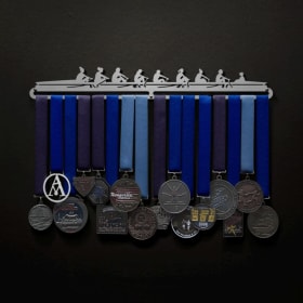 Medal hanger (female figures) item