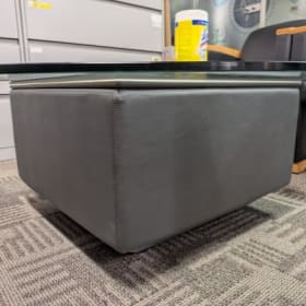 Glass Coffee table 4.5'Wx16.5"H with leather base item