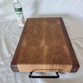 Photo of White Oak trimmed in Black Walnut Hand-crafted Cutting Board