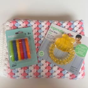 Photo of Beautiful homemade crochet baby blanket eater teether
