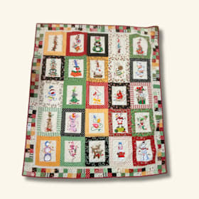 Photo of A Tower of Christmas Cheer Quilt