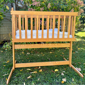 Photo of Handcrafted Solid Wood Baby Cradle