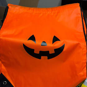 Photo of Orange Jack O Lantern Drawstring Bag