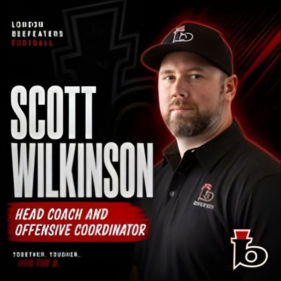 A man in a black polo shirt and baseball cap stands in the foreground with "SCOTT WILKINSON HEAD COACH AND OFFENSIVE COORDINATOR" text to his left, against a dark background with a football helmet graphic.