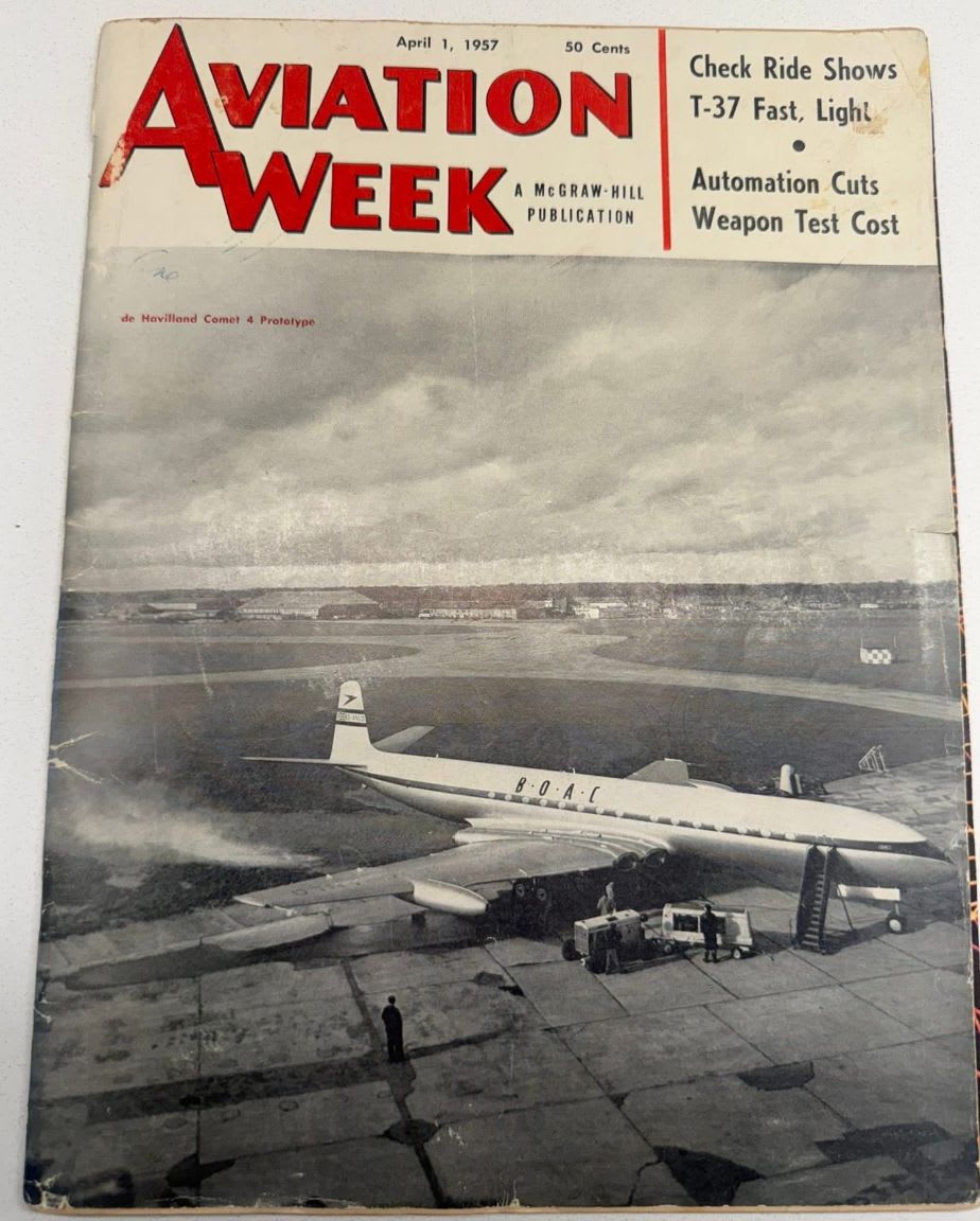 A vintage "Aviation Week" magazine cover from April 1, 1957, features a black and white photograph of a sleek, propeller-driven airplane on a tarmac in the foreground, with a hazy industrial background.