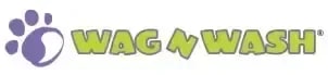 A purple paw print logo is to the left of the green text "WAG N' WASH" on a white background.