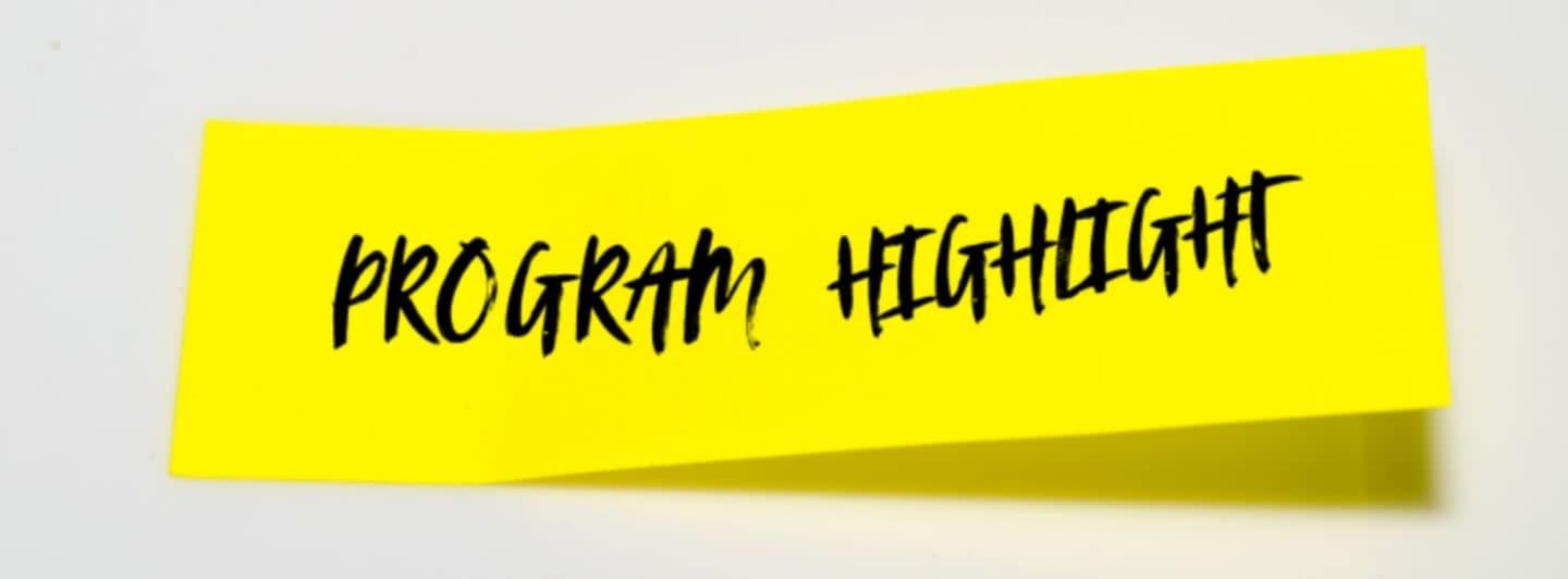 A bright yellow sticky note with "PROGRAM HIGHLIGHT" written in black marker is attached to a white surface.