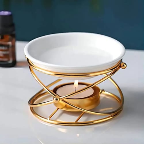 Brûleur d'huiles essentielles et de cire parfumée avec un support géométrique en métal doré