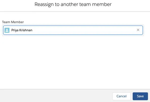 The Reassign to another team member popup allows you to search and select a team member to whom you can transfer an existing target assignment.