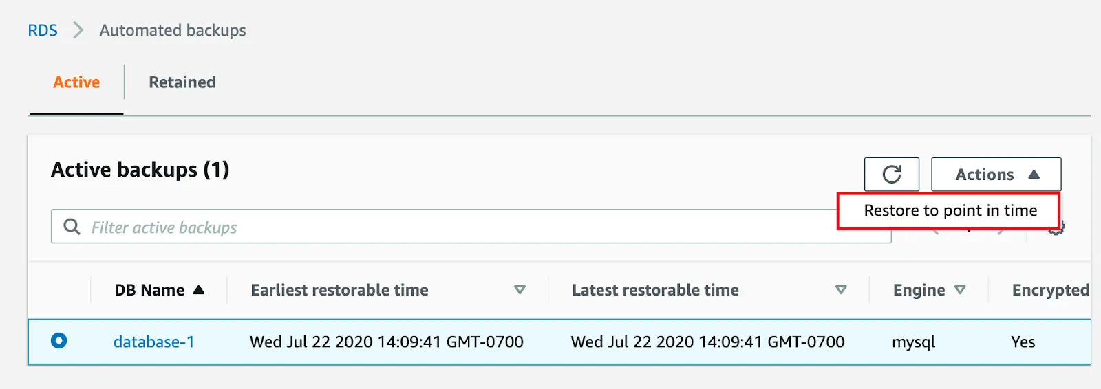 Choosing an automated backup to restore to a particular point in time.