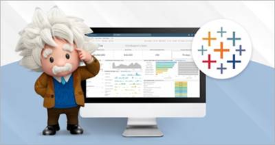 Salesforce Einstein standing next to a computer screen that shows visualizations in Tableau.