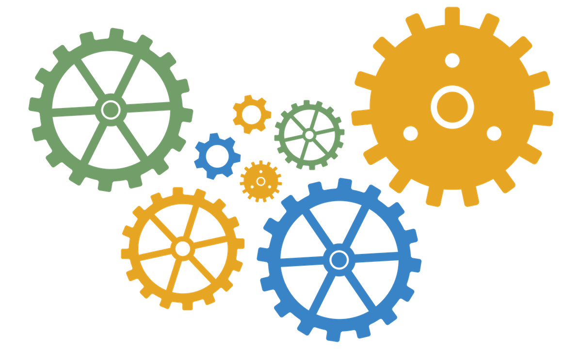 A cluster of machine gears that are different sizes, shapes, and colors