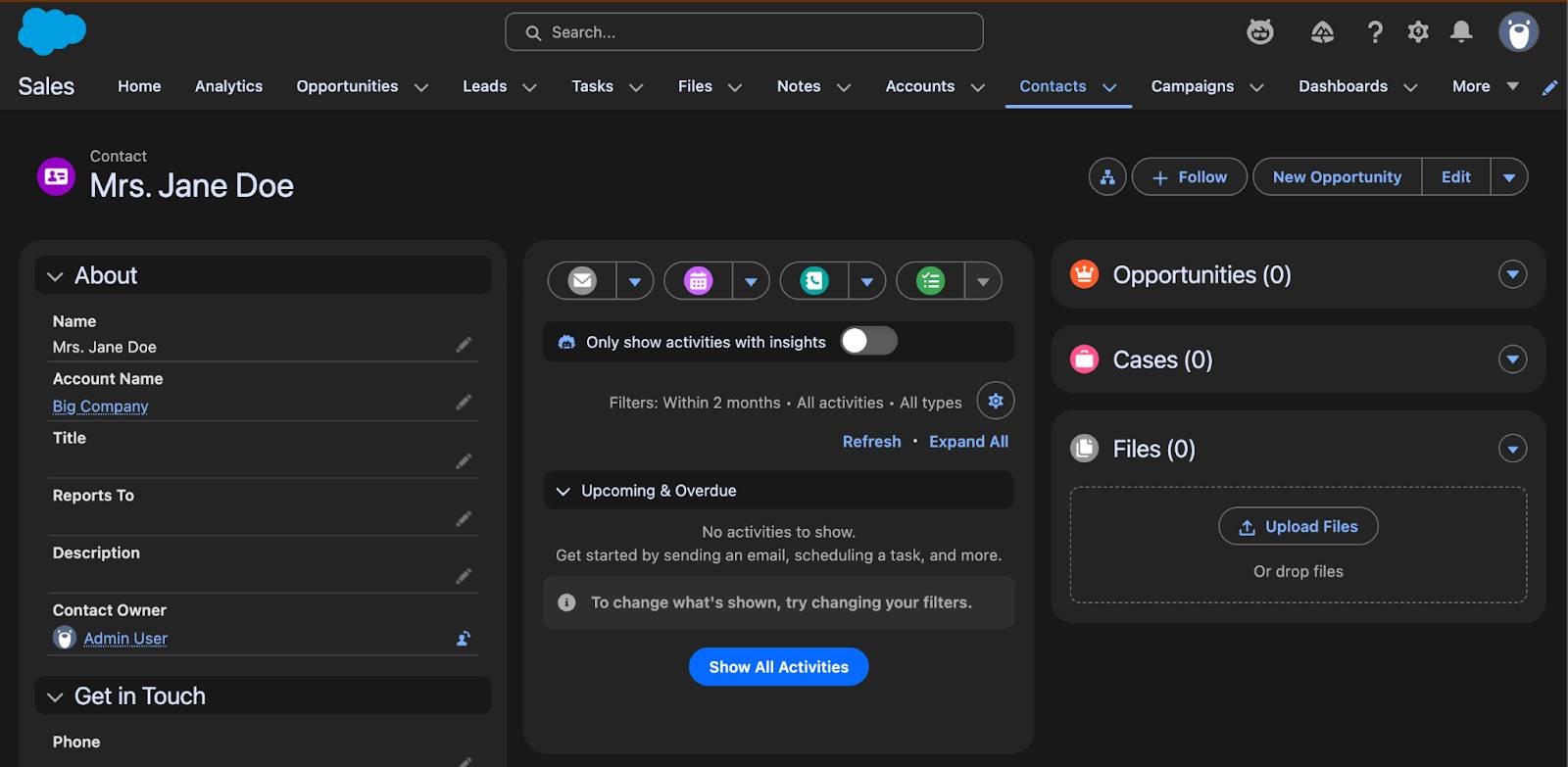 An example Salesforce org Contact page in Salesforce Cosmos theme dark mode, with a black background, white text, and bright-colored Salesforce Lightning Design System 2 buttons.