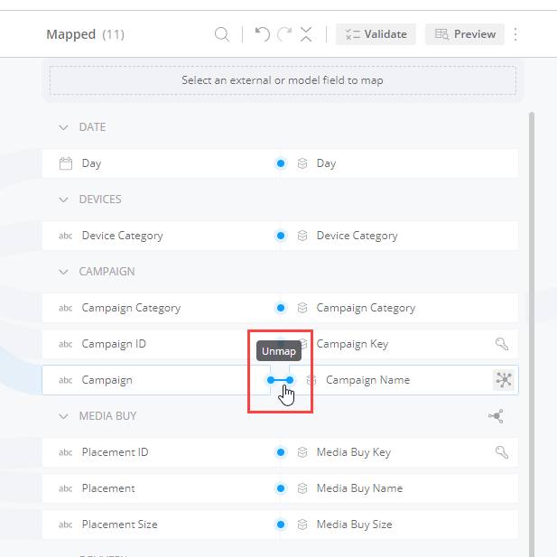 A mapped field connection is shown with the Unmap option highlighted