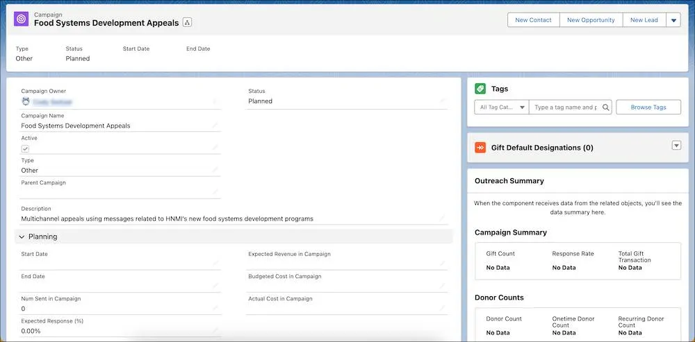 The outreach summary rollup fields on the campaign record currently have no data, but the categories and fields are displayed.