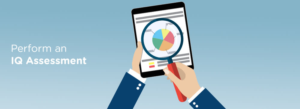 A cartoon pair of arms holding a magnifying glass to a pie chart on the screen of a computer tablet. Text reads: Perform an IQ Assessment.