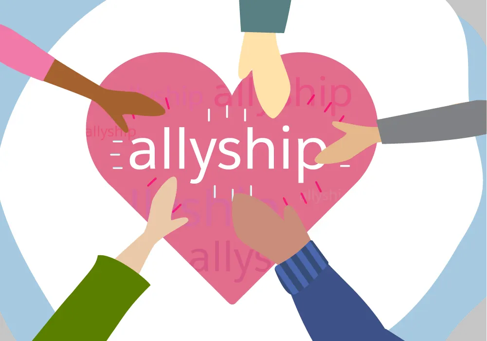 Several hands touching a heart that reads, “allyship.”