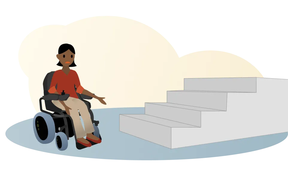 A person in a wheelchair next to a flight of stairs.