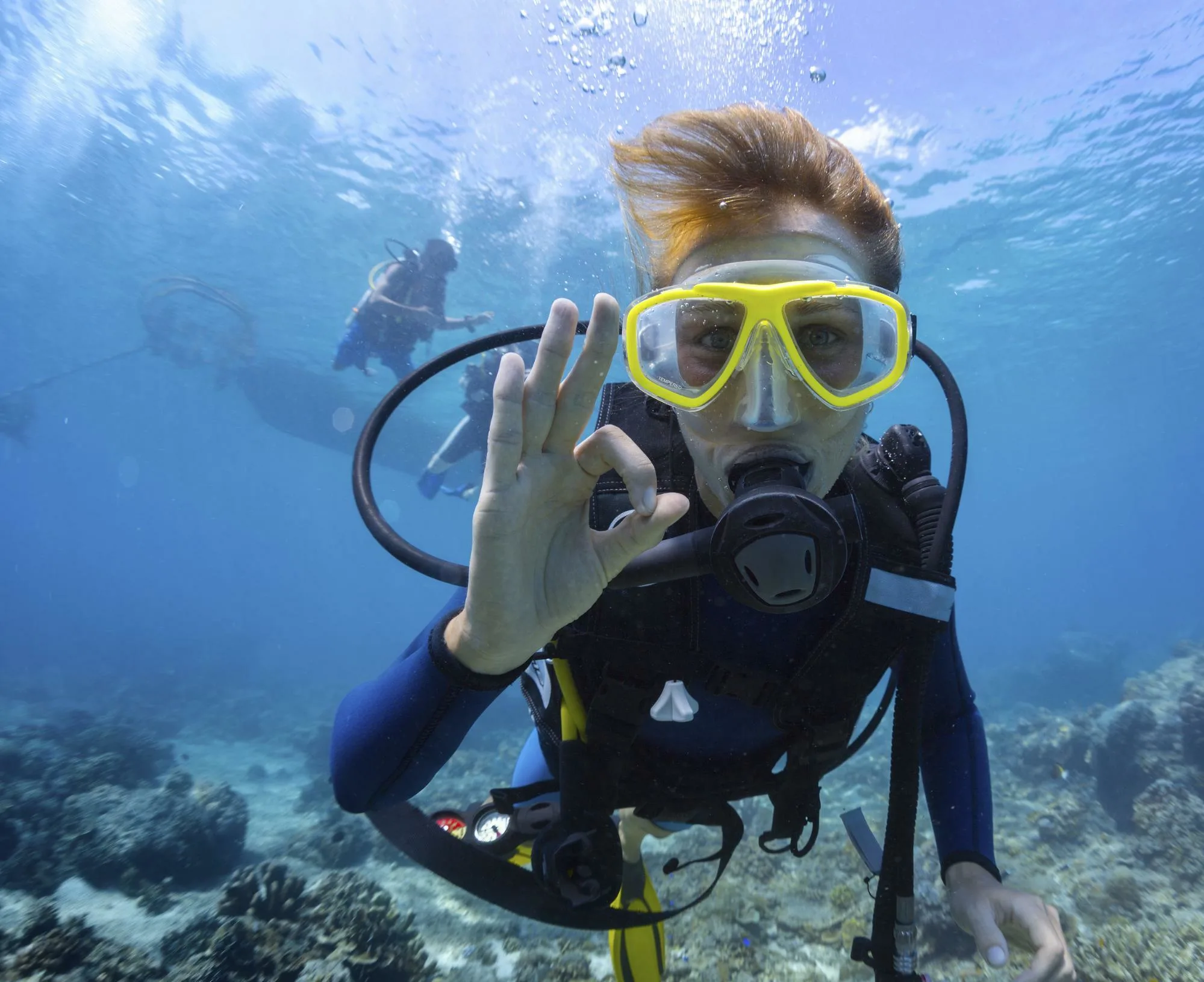 SCUBA diver signaling OK