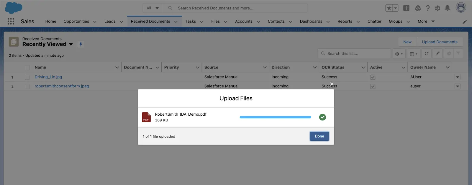 The Upload Files window showing Robert Smith’s document being uploaded from the Received Documents tab.