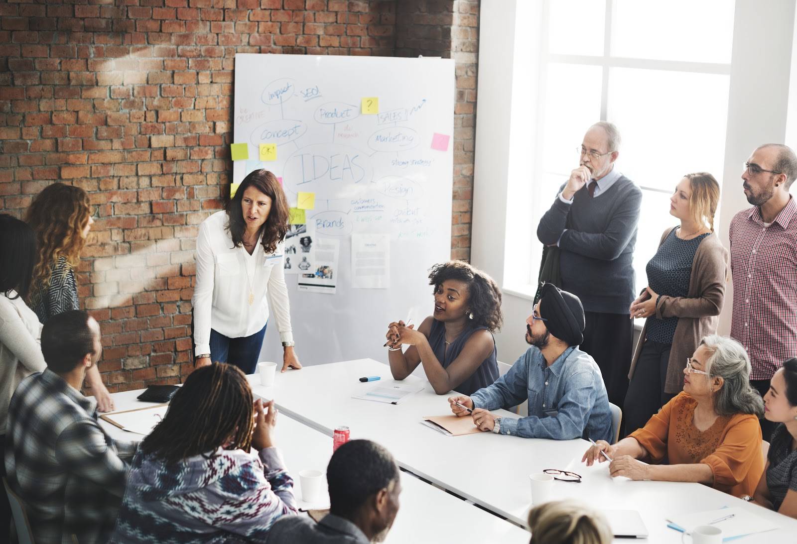 A business meeting with diverse employees.