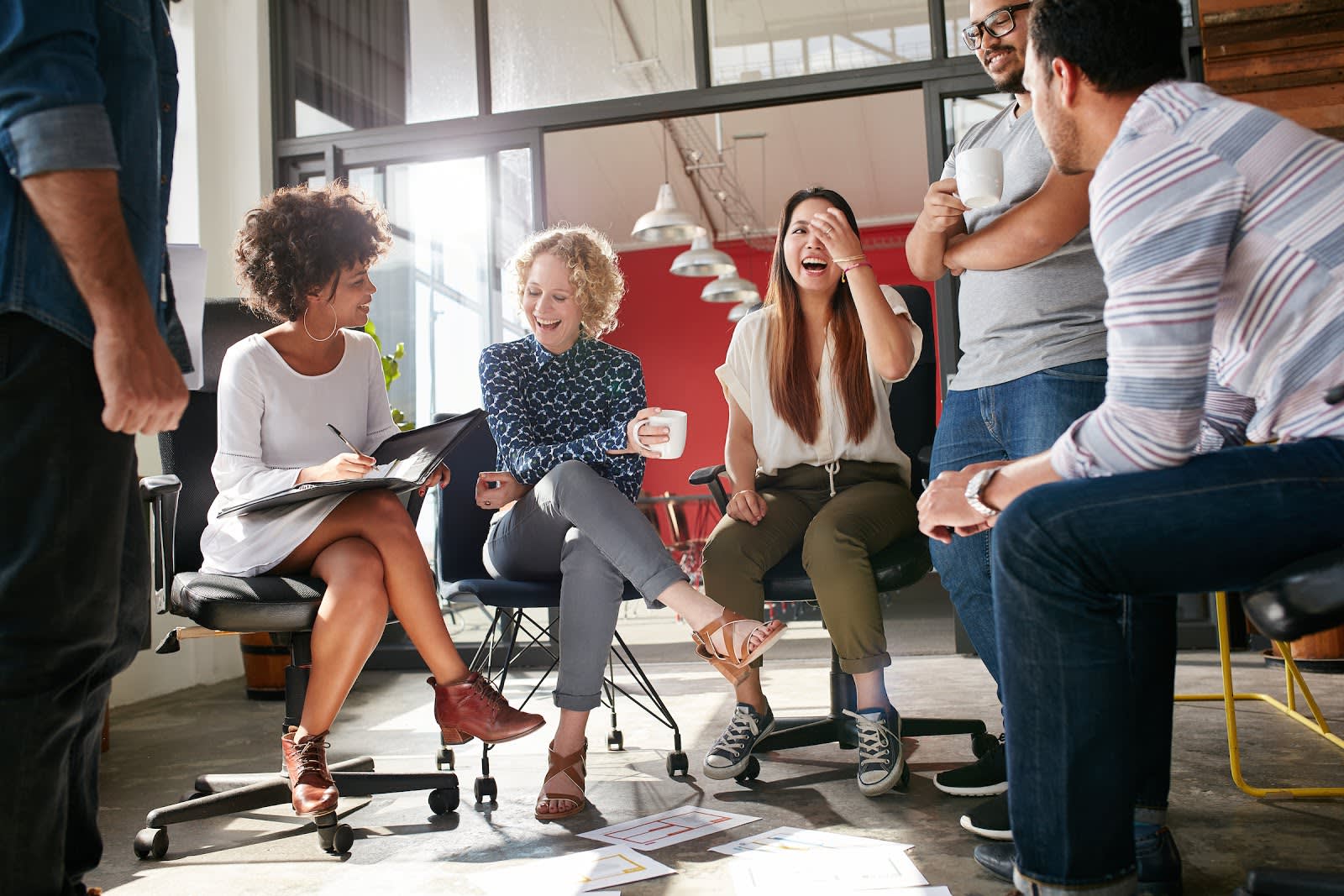 A photo of a group of people meeting.