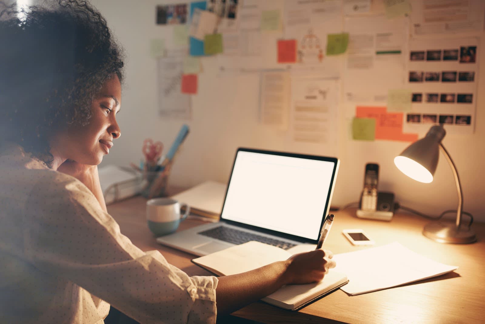 A photo of a person working from a home office.