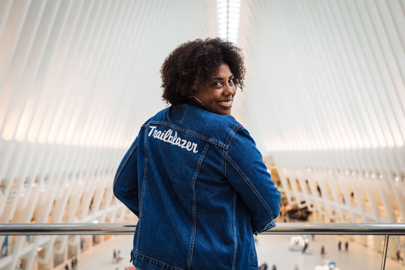 A woman wearing a “Trailblazer” jacket