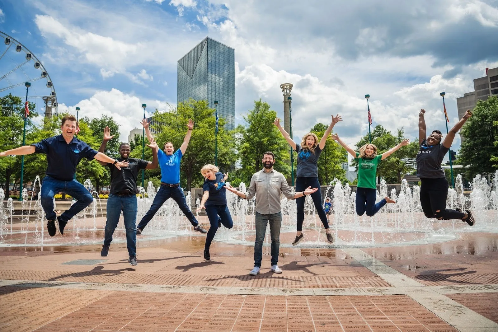 A group of excited Salesforce employees