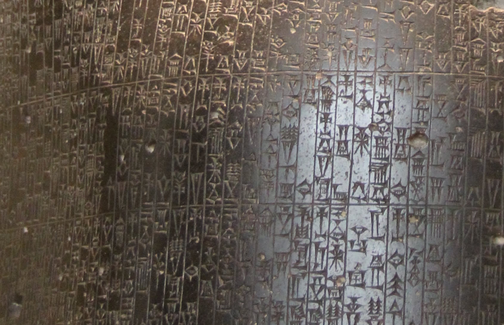 : Stone tablet showing cuneiform writing in columns