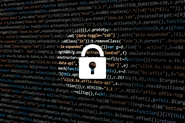 Padlock over a screen of computer code